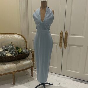 Halter top light blue dress with peekaboo sides. Size medium. NWOT.
